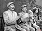1952年8月11日毛主席、朱总司令、周总理在第一届全军运动会上